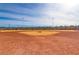 View of baseball infield with lighting and fence at 165 Arrow Point Ln, Henderson, NV 89011