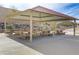 Covered picnic area with multiple tables for outdoor gatherings at 165 Arrow Point Ln, Henderson, NV 89011