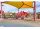 Covered playground with playset, slides, and climbing features at 165 Arrow Point Ln, Henderson, NV 89011