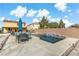 Stunning pool with patio and seating area in the backyard at 165 Arrow Point Ln, Henderson, NV 89011