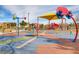 Colorful splash pad play area with spray features for children at 165 Arrow Point Ln, Henderson, NV 89011