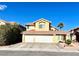 Two-story house with a three-car garage and desert landscaping at 1764 Sunflower Ct, Henderson, NV 89074