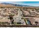 Aerial view showing a single-Gathering home with pool and desert landscape at 1960 S Vineyard Dr, Pahrump, NV 89048