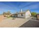 Large backyard with brick patio and fire pit at 1960 S Vineyard Dr, Pahrump, NV 89048