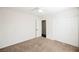 Bright bedroom featuring carpet and double door closet at 1960 S Vineyard Dr, Pahrump, NV 89048