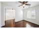 Dining area with hardwood floors and an archway at 1960 S Vineyard Dr, Pahrump, NV 89048