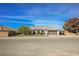 Single story home with landscaped front yard and garage at 1960 S Vineyard Dr, Pahrump, NV 89048