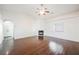 Bright living room with hardwood floors, fireplace, and high ceilings at 1960 S Vineyard Dr, Pahrump, NV 89048