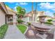 Landscaped front yard with a fountain and walkway at 1968 Revere Ct, Henderson, NV 89014