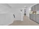 Upper level hallway offering a view of bedrooms and a grey cabinet at 1968 Revere Ct, Henderson, NV 89014