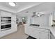 Spacious kitchen with island, stainless steel appliances, and white cabinets at 1968 Revere Ct, Henderson, NV 89014