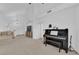 Living area with a piano, neutral decor and high ceilings at 1968 Revere Ct, Henderson, NV 89014