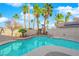 Relaxing pool area with palm trees at 1968 Revere Ct, Henderson, NV 89014