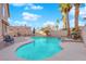 Inviting kidney-shaped pool with ample patio space at 1968 Revere Ct, Henderson, NV 89014