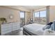 Main bedroom with access to balcony and city views at 200 W Sahara Ave # 1012, Las Vegas, NV 89102