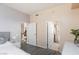 Bright bedroom with ensuite bathroom and gray decor at 200 W Sahara Ave # 1012, Las Vegas, NV 89102