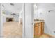 Small bathroom with granite vanity and oak cabinets at 2000 Goldhill Ave, Las Vegas, NV 89106