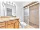 Clean bathroom with granite vanity, large mirror and walk-in shower at 2000 Goldhill Ave, Las Vegas, NV 89106