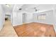 Hardwood floors in living area, open to kitchen and hallway at 2000 Goldhill Ave, Las Vegas, NV 89106