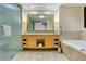 Elegant bathroom with a double vanity and soaking tub at 2000 N Fashion Show Dr # 3808, Las Vegas, NV 89109