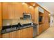 Compact kitchenette with microwave and sink at 2000 N Fashion Show Dr # 3808, Las Vegas, NV 89109