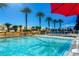 Inviting pool area with lounge chairs and palm trees at 2000 N Fashion Show Dr # 3808, Las Vegas, NV 89109