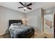 Bedroom with ceiling fan, double door closet and carpet flooring at 201 White Mule Ave, Las Vegas, NV 89148