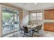 Kitchen dining area with access to backyard patio at 201 White Mule Ave, Las Vegas, NV 89148