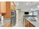 Spacious kitchen with stainless steel appliances and granite countertops at 201 White Mule Ave, Las Vegas, NV 89148