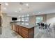 Open kitchen island with granite countertops and seating at 201 White Mule Ave, Las Vegas, NV 89148