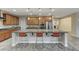 Spacious kitchen with granite island and wood cabinets at 201 White Mule Ave, Las Vegas, NV 89148