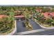 Aerial view of community entrance with palm trees and landscaping at 2200 S Fort Apache Rd # 1065, Las Vegas, NV 89117