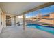 Inviting kidney-shaped pool with spacious patio at 2214 Sexton Ave, North Las Vegas, NV 89031