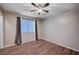 Bright bedroom with ceiling fan and large window at 2214 Sexton Ave, North Las Vegas, NV 89031