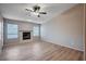 Living room with wood-look floors and fireplace at 2214 Sexton Ave, North Las Vegas, NV 89031