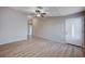 Living area with wood-look floors and front door entry at 2214 Sexton Ave, North Las Vegas, NV 89031