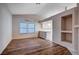 Living room with built-in shelving and kitchen view at 2214 Sexton Ave, North Las Vegas, NV 89031