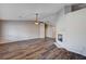 Spacious living room with wood floors and ceiling fan at 2214 Sexton Ave, North Las Vegas, NV 89031