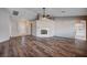 Bright living room featuring wood floors and fireplace at 2214 Sexton Ave, North Las Vegas, NV 89031