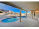 Relaxing pool and patio area with covered seating at 2214 Sexton Ave, North Las Vegas, NV 89031