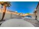 Spacious patio and kidney shaped pool at 2214 Sexton Ave, North Las Vegas, NV 89031