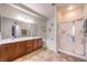 Elegant bathroom with double vanity and large shower at 2408 Sky Watcher St, Henderson, NV 89044