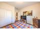 Charming bedroom with a full-size bed and built-in shelving at 2408 Sky Watcher St, Henderson, NV 89044