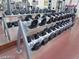 Fitness center with a variety of dumbbells for strength training at 2408 Sky Watcher St, Henderson, NV 89044