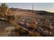 Backyard view of a rocky landscape and a small table at 2429 Anderson Park Dr, Henderson, NV 89044