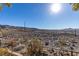 A backyard featuring desert landscaping and views of the surrounding desert and mountains at 2429 Anderson Park Dr, Henderson, NV 89044
