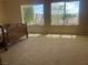 Bedroom featuring neutral carpeting and a view of the landscape at 2429 Anderson Park Dr, Henderson, NV 89044