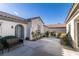 Front courtyard with stone pathway, bench, and gated entrance at 2429 Anderson Park Dr, Henderson, NV 89044