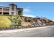Beautiful waterfall feature and landscaping outside the building at 2429 Anderson Park Dr, Henderson, NV 89044