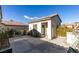 Charming single-story home with a concrete yard and white exterior at 2429 Anderson Park Dr, Henderson, NV 89044